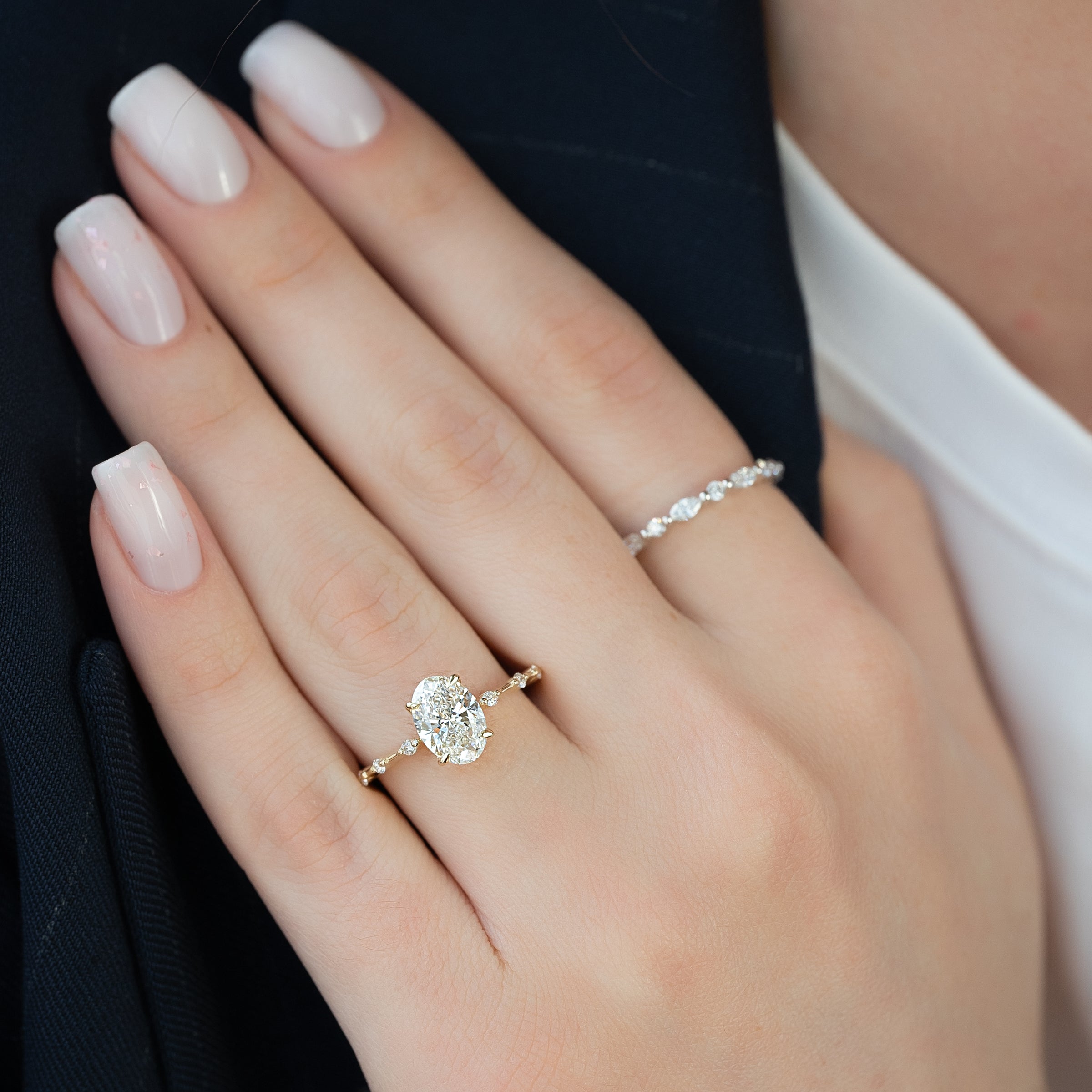 The Penelope Set With A 2 Carat Oval Lab Diamond