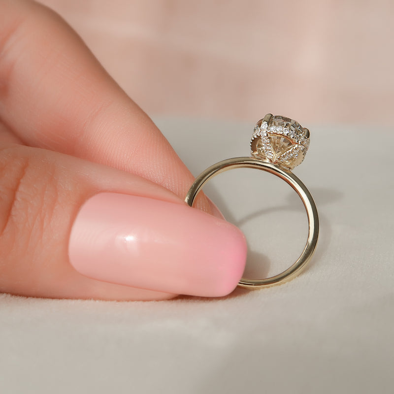 The Crown Kamellie Set With A 2 Carat Oval Lab Diamond