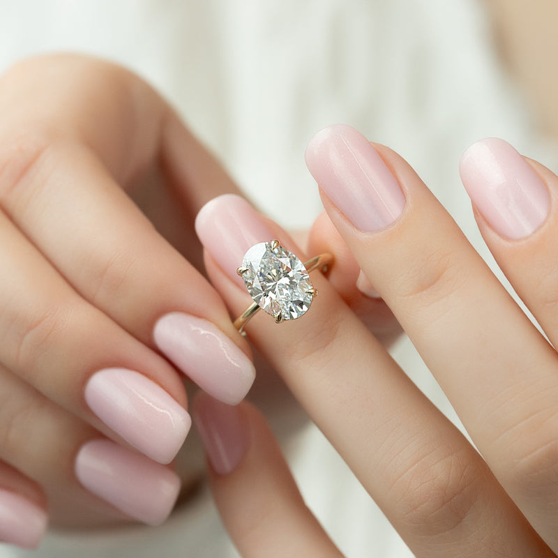 The Crown Kamellie Set With A 2 Carat Oval Lab Diamond