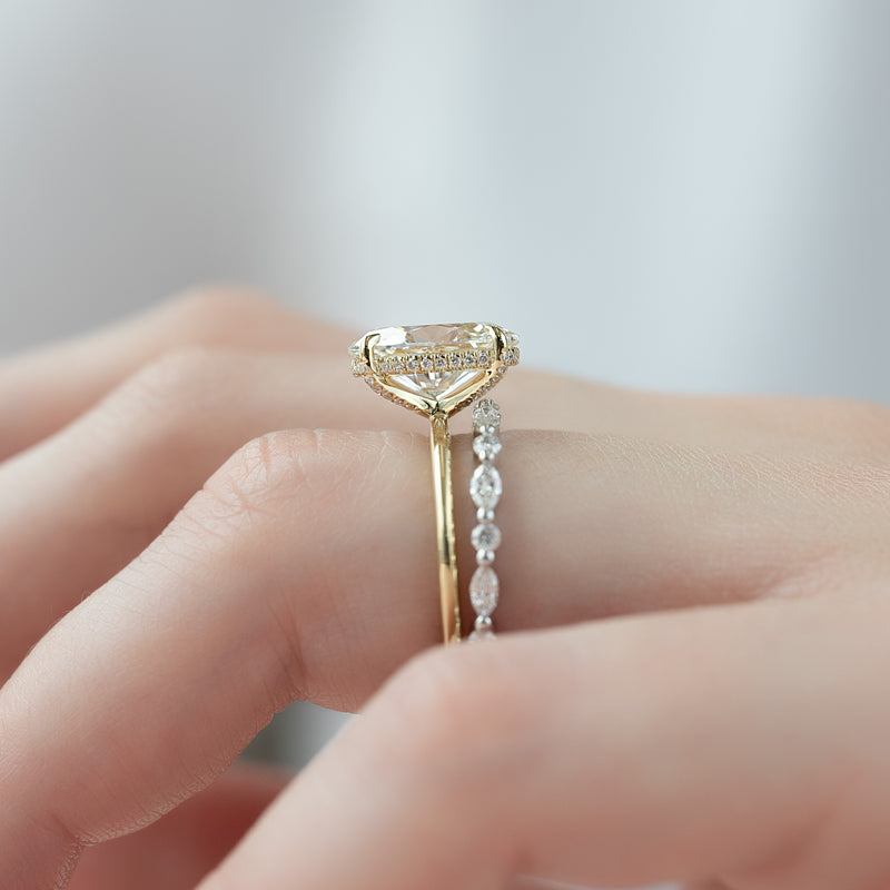 The Crown Kamellie Set With A 2 Carat Oval Lab Diamond