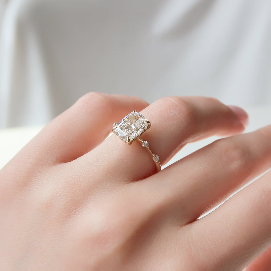 The Hidden Halo Penelope Set With A 2 Carat Elongated Cushion Lab Diamond