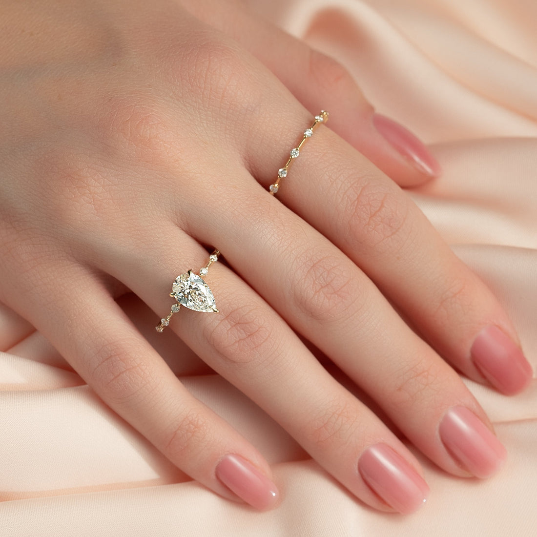 The Hidden Halo Penelope Set With A 2 Carat Pear Lab Diamond