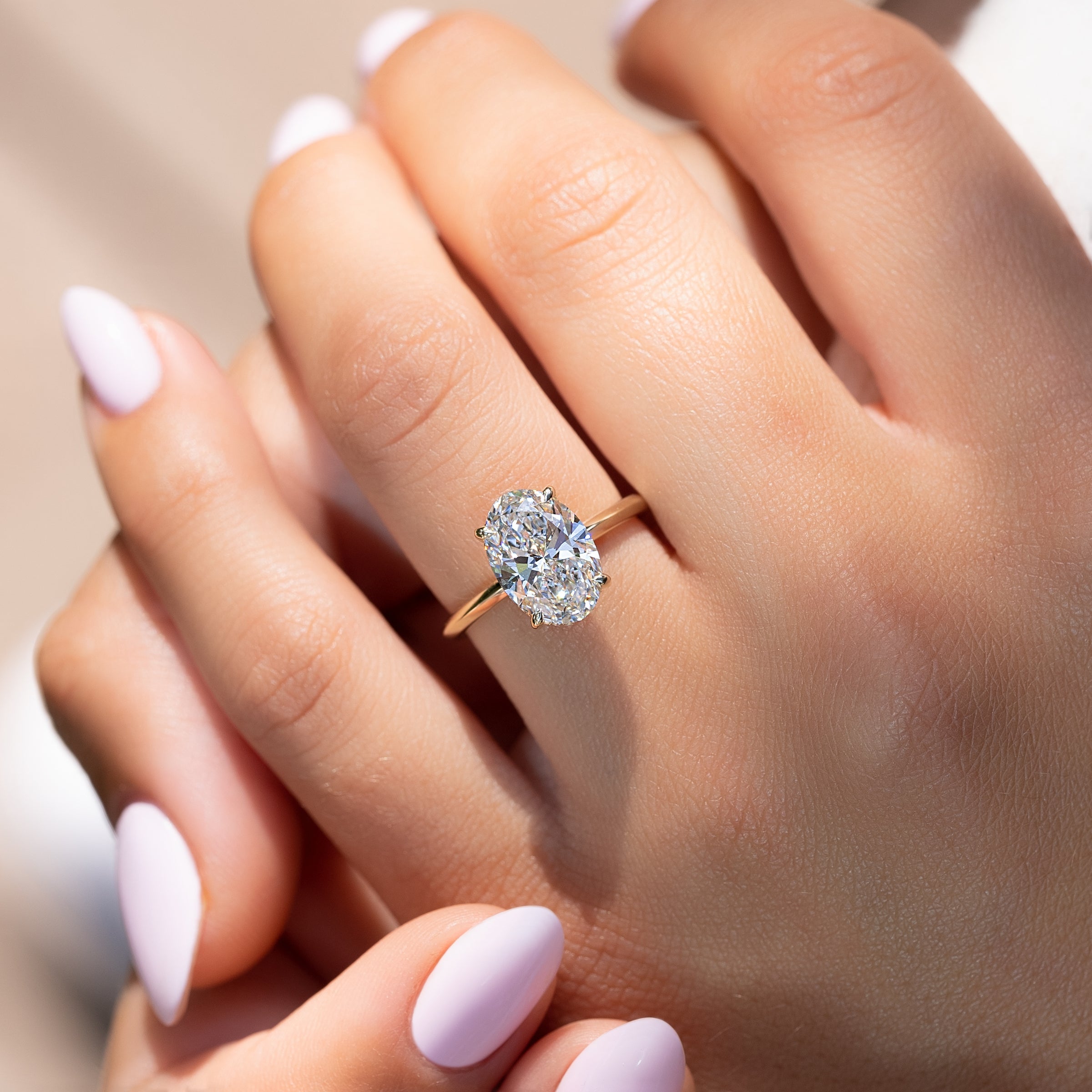 The Razor Kamellie Set With A 2 Carat Oval Lab Diamond
