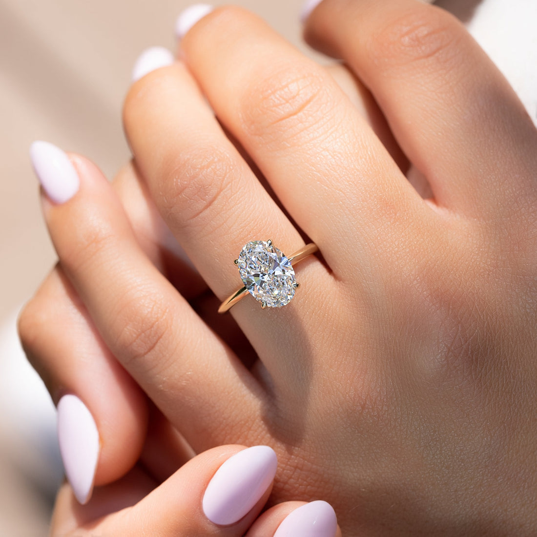 The Razor Kamellie Set With A 2 Carat Oval Lab Diamond