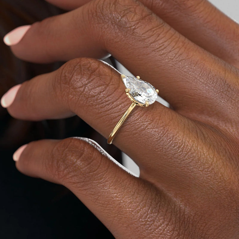 The Petal Kamellie Set With A 2 Carat Pear Lab Diamond
