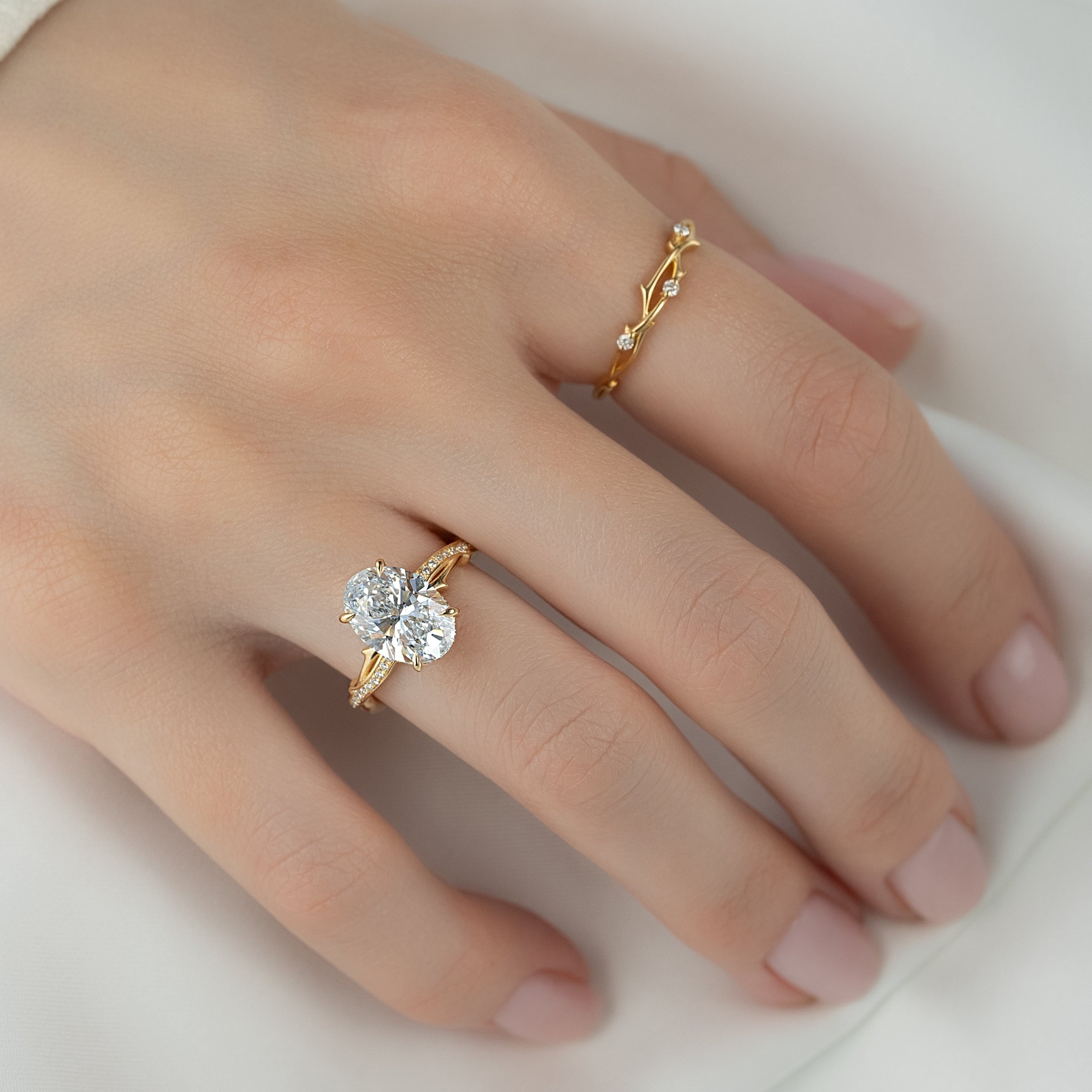 The Pave Twig Set With A 2 Carat Oval Lab Diamond