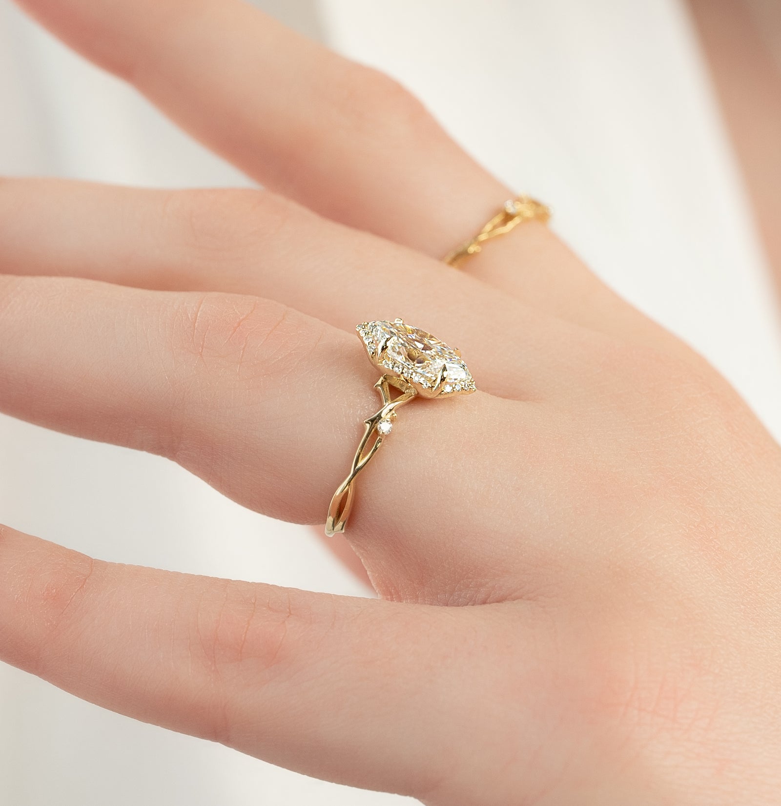 The Halo Twig Set With A 2 Carat Marquise Lab Diamond