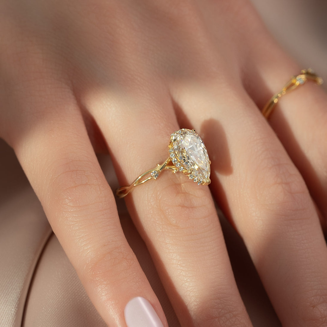 The Halo Twig Set With A 2 Carat Pear Lab Diamond