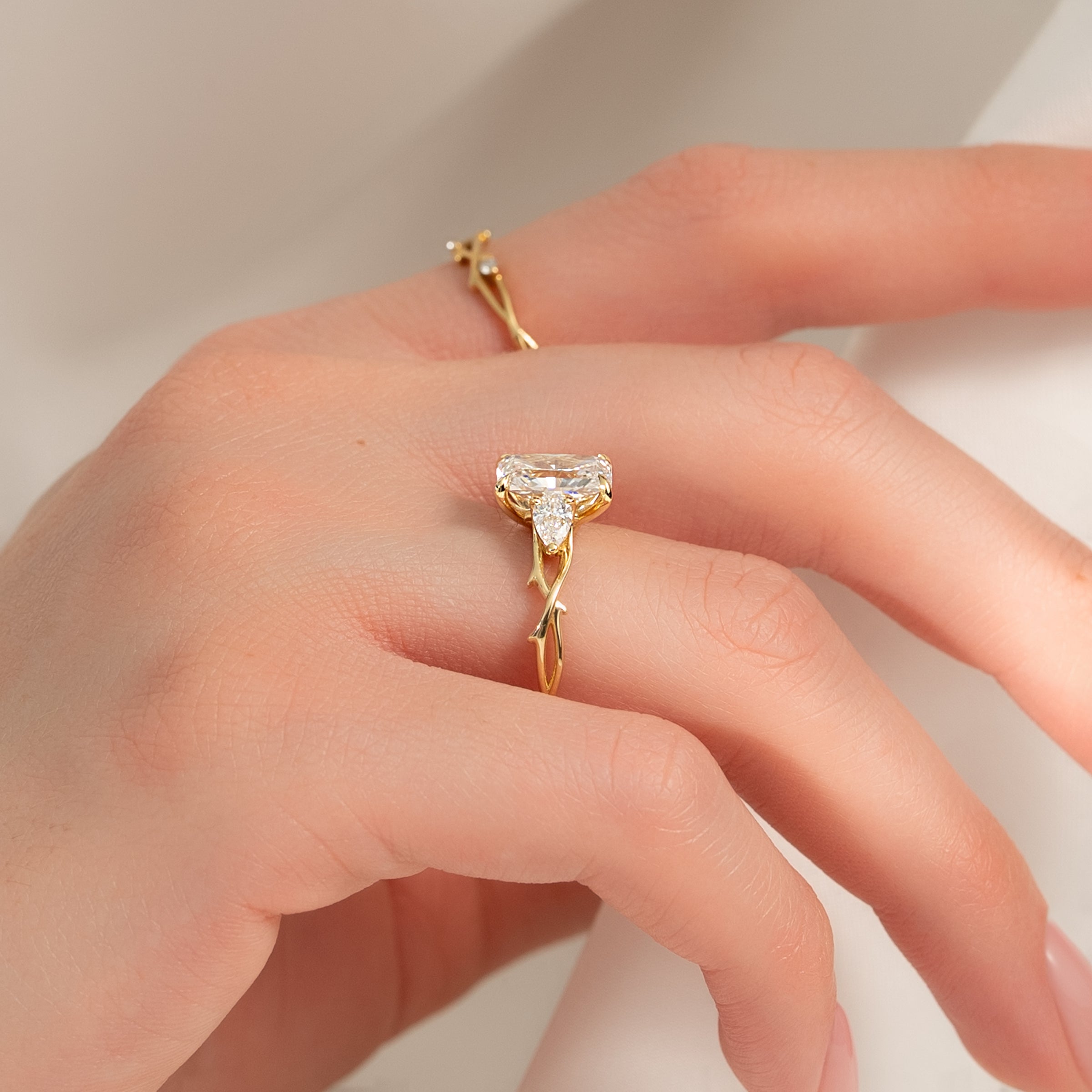 The Three Stone Twig Set With A 2 Carat Radiant Lab Diamond